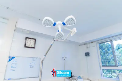 Surgical light fixture mounted in the Siloam Hospital operating theatre