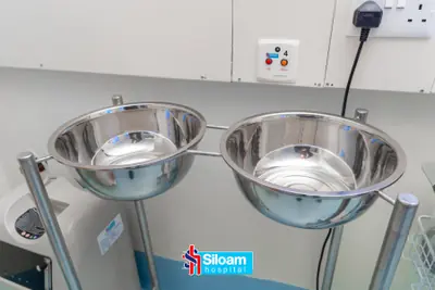 Stainless steel surgical preparation basins at Siloam Hospital